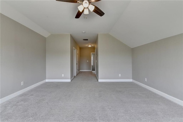 3910 Cameron Ct, Cumming, GA 30040 - empty room with ceiling fan, lofted ceiling, light colored carpet, and baseboards