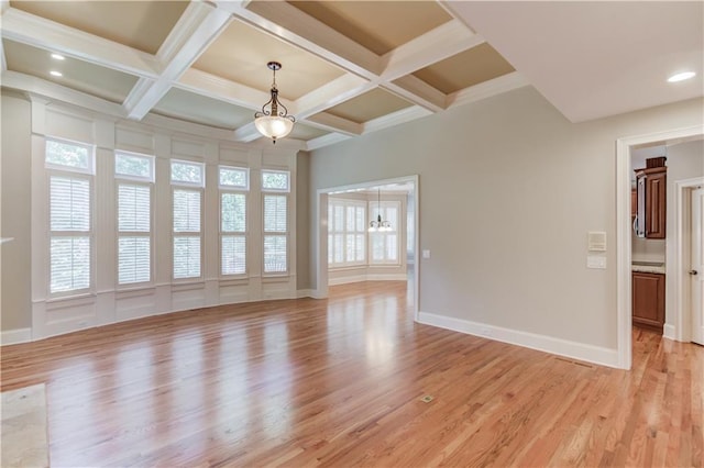 255 Beech Tree Holw, Sugar Hill, GA 30518 - spare room featuring a chandelier, light wood-style floors, baseboards, beamed ceiling, and recessed lighting