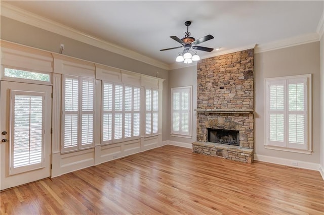 255 Beech Tree Holw, Sugar Hill, GA 30518 - unfurnished living room featuring wood finished floors, ceiling fan, a fireplace, ornamental molding, and baseboards