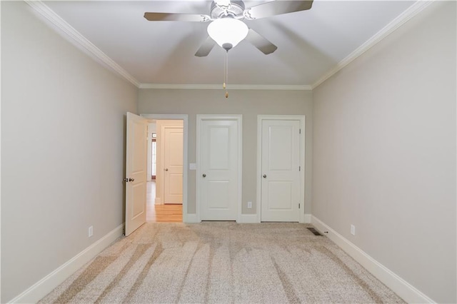 255 Beech Tree Holw, Sugar Hill, GA 30518 - unfurnished bedroom featuring crown molding, carpet floors, baseboards, and ceiling fan