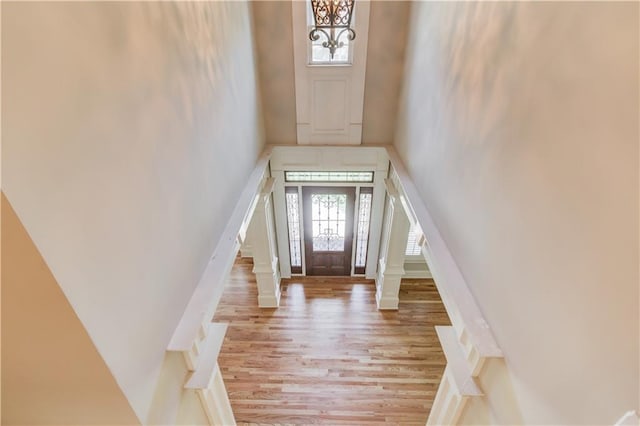 255 Beech Tree Holw, Sugar Hill, GA 30518 - entrance foyer with a towering ceiling and light wood-style flooring