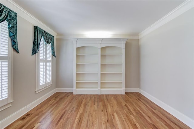 255 Beech Tree Holw, Sugar Hill, GA 30518 - unfurnished room with plenty of natural light, light wood-style flooring, baseboards, and ornamental molding