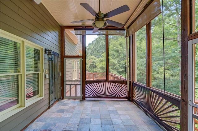 255 Beech Tree Holw, Sugar Hill, GA 30518 - unfurnished sunroom featuring ceiling fan and vaulted ceiling