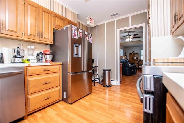 kitchen featuring stainless steel refrigerator with ice dispenser, crown molding, light wood-type flooring, a baseboard radiator, and ceiling fan