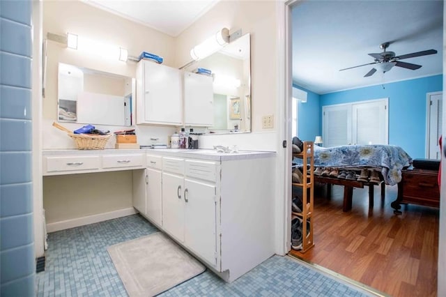 bathroom featuring vanity and ceiling fan