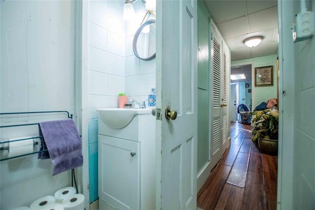 bathroom featuring vanity and hardwood / wood-style flooring