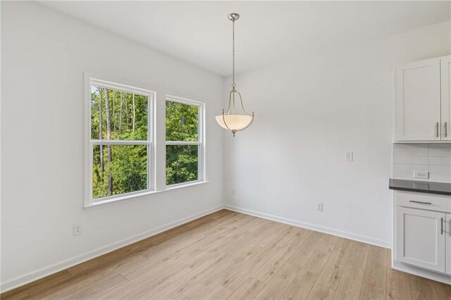 7252 Eton Ln, Locust Grove, GA 30248 - unfurnished living room with ceiling fan and stairs