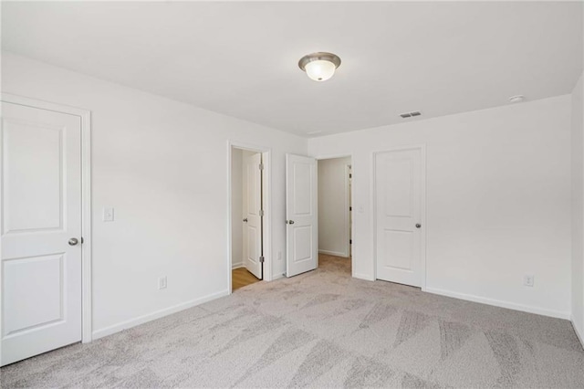 7252 Eton Ln, Locust Grove, GA 30248 - unfurnished bedroom with carpet flooring and baseboards