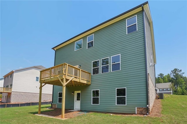 7252 Eton Ln, Locust Grove, GA 30248 - back of property with a lawn and a wooden deck