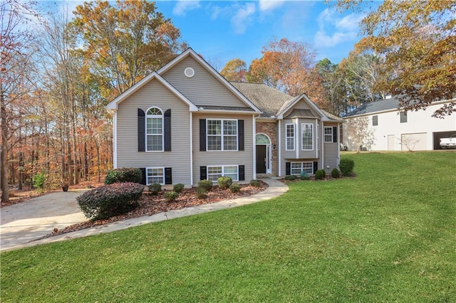 207 Amaranth Ct, Ball Ground, GA 30107 - split foyer home with a front lawn