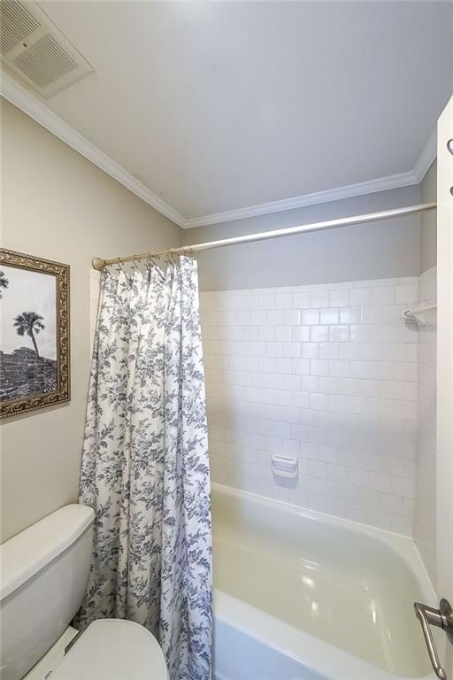 bathroom with crown molding, shower / bath combo, and toilet