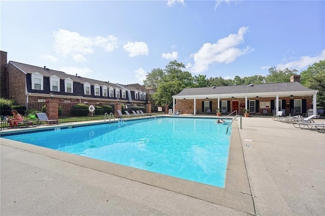 view of swimming pool featuring a patio area