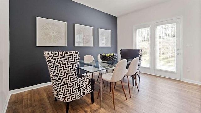 dining area featuring hardwood / wood-style flooring