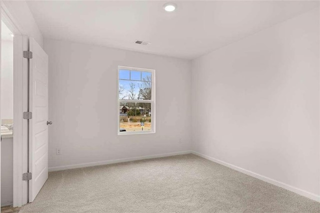 view of carpeted spare room