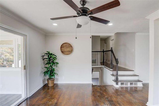 interior space featuring crown molding, ceiling fan, and dark hardwood / wood-style floors