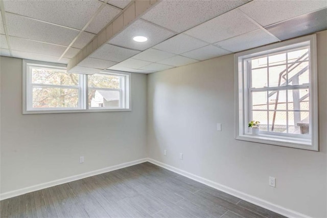 unfurnished room featuring dark wood-type flooring