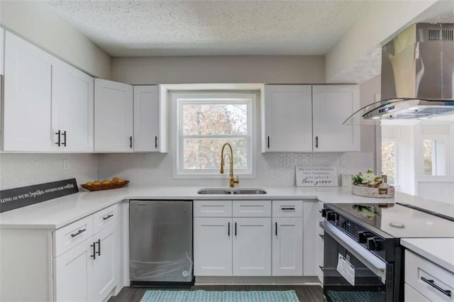 kitchen with exhaust hood, white cabinets, sink, range with electric stovetop, and a textured ceiling