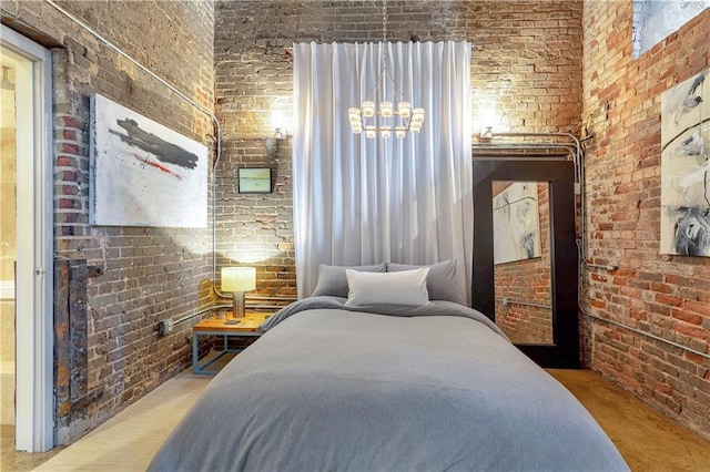 bedroom with brick wall