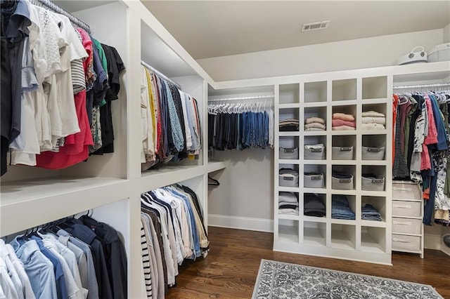 spacious closet with visible vents and wood finished floors
