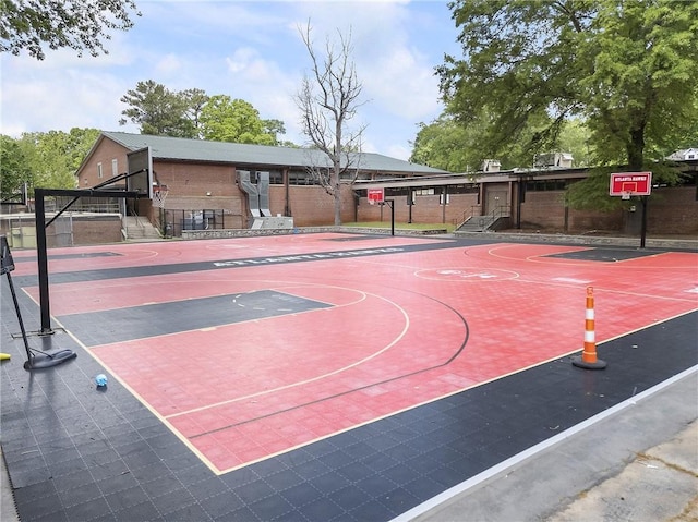 view of sport court featuring fence and community basketball court