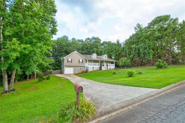 1137 Eagles Nest Cir, Carrollton, GA 30116 - view of front of house featuring an attached garage, a front yard, and driveway