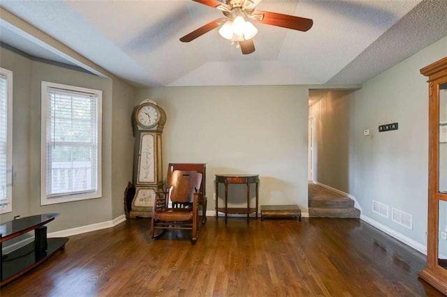 1137 Eagles Nest Cir, Carrollton, GA 30116 - living area featuring wood finished floors, a ceiling fan, and vaulted ceiling