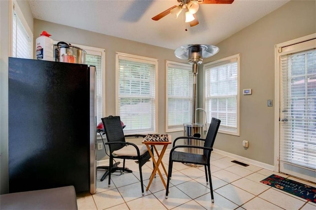 1137 Eagles Nest Cir, Carrollton, GA 30116 - dining area featuring a ceiling fan, light tile patterned flooring, healthy amount of natural light, and a desk