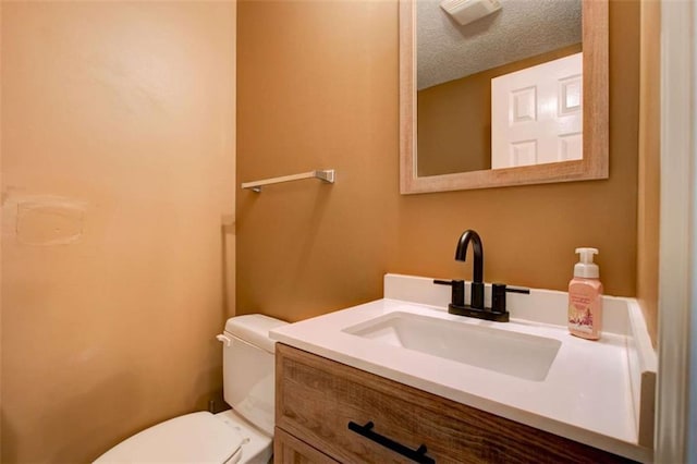 1137 Eagles Nest Cir, Carrollton, GA 30116 - half bathroom featuring vanity and a textured ceiling