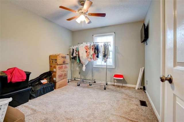 1137 Eagles Nest Cir, Carrollton, GA 30116 - carpeted bedroom with a textured ceiling and ceiling fan