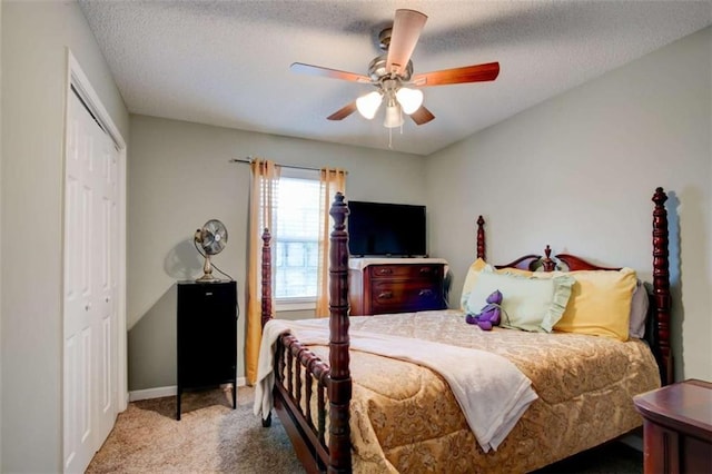 1137 Eagles Nest Cir, Carrollton, GA 30116 - bedroom with carpet flooring, a closet, a ceiling fan, and a textured ceiling