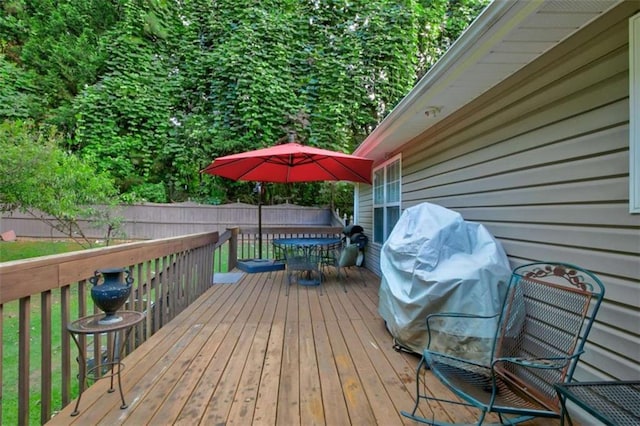 1137 Eagles Nest Cir, Carrollton, GA 30116 - wooden terrace with outdoor dining area and a fenced backyard
