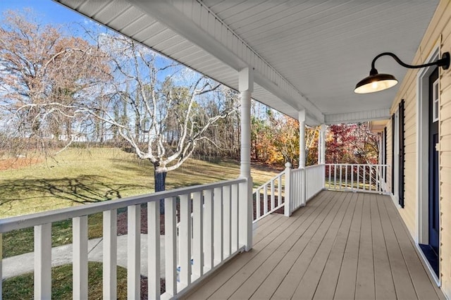 wooden terrace featuring a porch