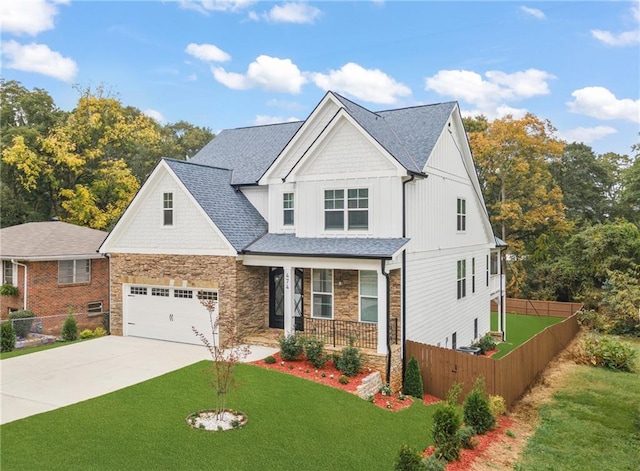 view of front of house with a porch and a front yard