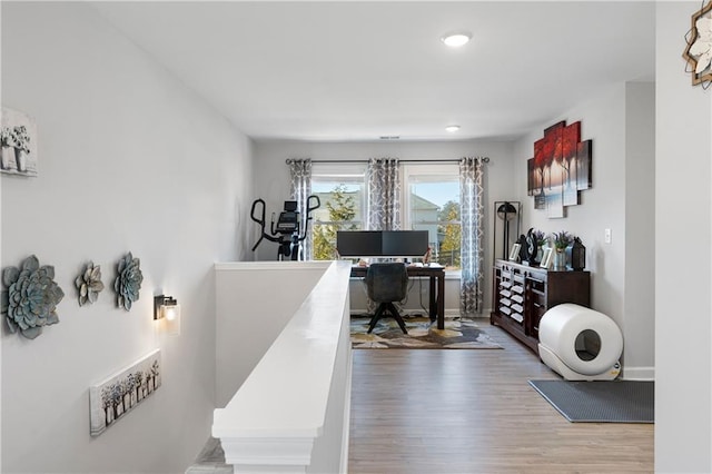 office area with hardwood / wood-style floors