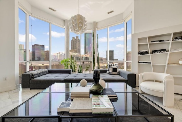 285 Centennial Olympic Park Dr NW Unit Ph2-7, Atlanta, GA 30313 - living area with a skyline view and marble finish flooring