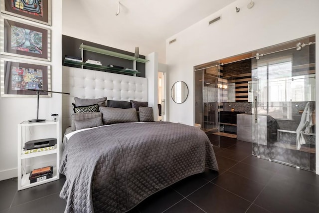 285 Centennial Olympic Park Dr NW Unit Ph2-7, Atlanta, GA 30313 - bedroom with tile patterned flooring