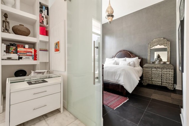 285 Centennial Olympic Park Dr NW Unit Ph2-7, Atlanta, GA 30313 - bedroom featuring tile walls