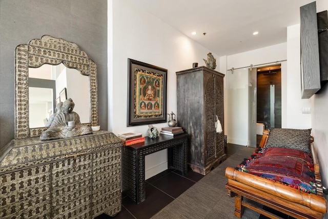 285 Centennial Olympic Park Dr NW Unit Ph2-7, Atlanta, GA 30313 - tiled bedroom with a barn door and recessed lighting