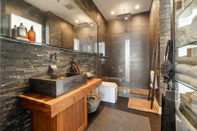 285 Centennial Olympic Park Dr NW Unit Ph2-7, Atlanta, GA 30313 - bathroom with walk in shower, tile patterned floors, decorative backsplash, and vanity