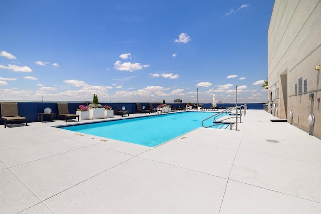285 Centennial Olympic Park Dr NW Unit Ph2-7, Atlanta, GA 30313 - community pool featuring a patio area