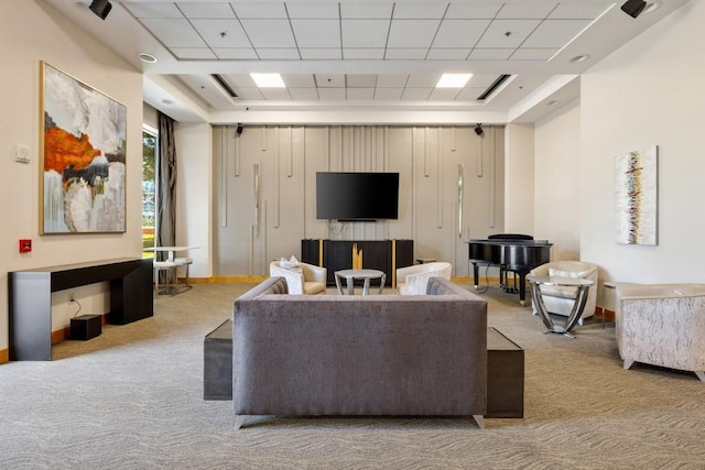 285 Centennial Olympic Park Dr NW Unit Ph2-7, Atlanta, GA 30313 - carpeted living area with a tray ceiling, a paneled ceiling, and baseboards