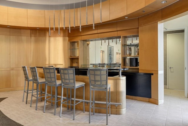 285 Centennial Olympic Park Dr NW Unit Ph2-7, Atlanta, GA 30313 - bar area featuring light tile patterned flooring