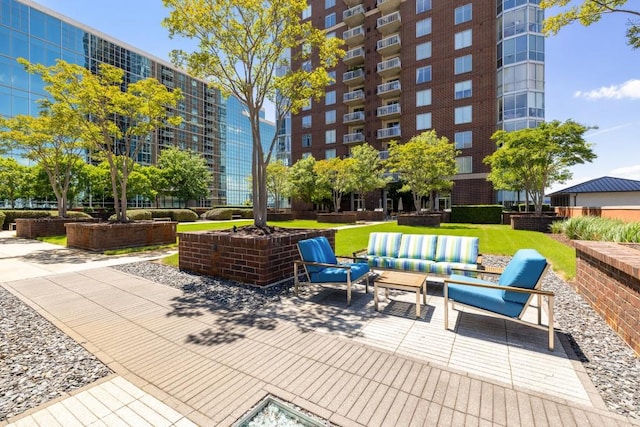 285 Centennial Olympic Park Dr NW Unit Ph2-7, Atlanta, GA 30313 - view of patio with an outdoor living space