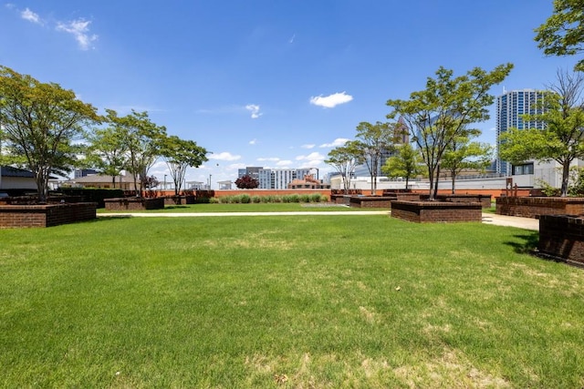 285 Centennial Olympic Park Dr NW Unit Ph2-7, Atlanta, GA 30313 - view of community featuring a yard