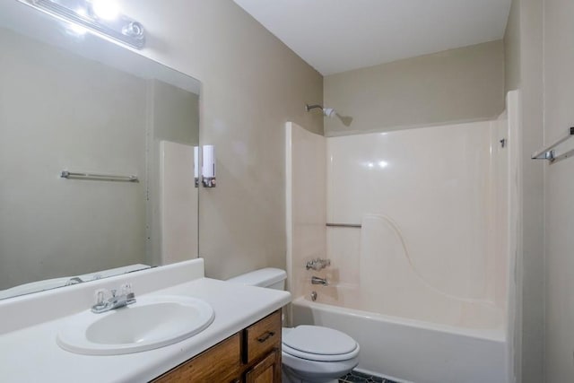 full bathroom featuring vanity, toilet, and tub / shower combination