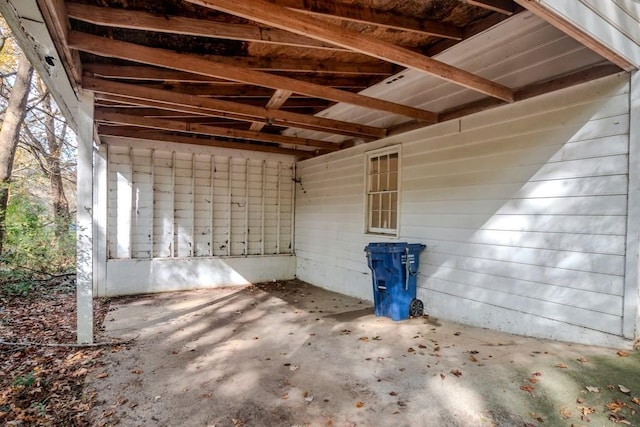 misc room with concrete flooring