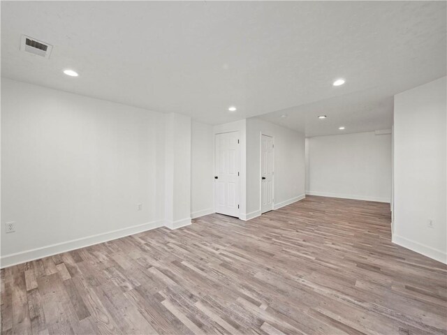 6333 Horizon Dr, Flowery Branch, GA 30542 - below grade area with wood finished floors, recessed lighting, and baseboards