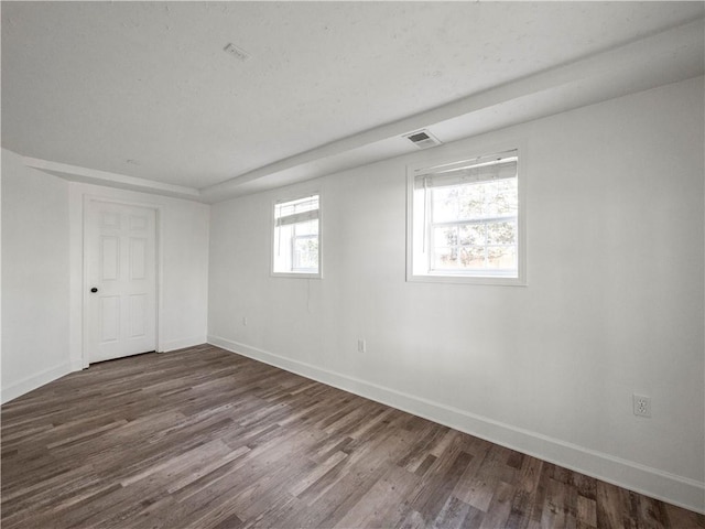 6333 Horizon Dr, Flowery Branch, GA 30542 - unfurnished bedroom featuring baseboards and dark wood-style flooring