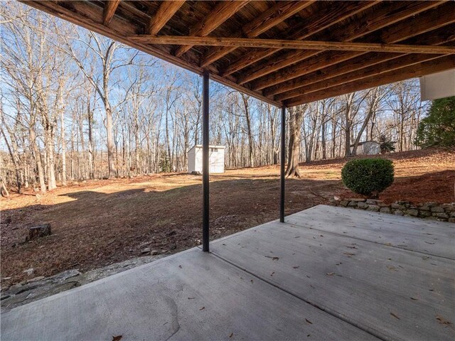 6333 Horizon Dr, Flowery Branch, GA 30542 - view of patio featuring a shed and an outdoor structure
