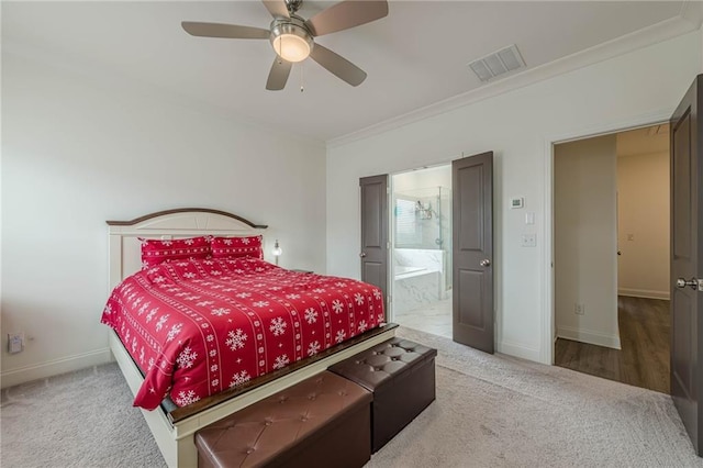 bedroom featuring carpet flooring, baseboards, visible vents, and ornamental molding